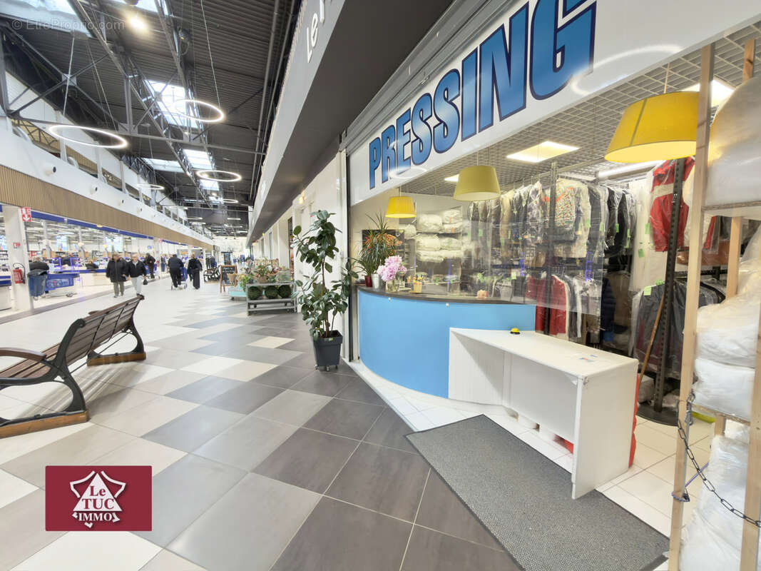 Pressing dans un hypermarché - photo 3