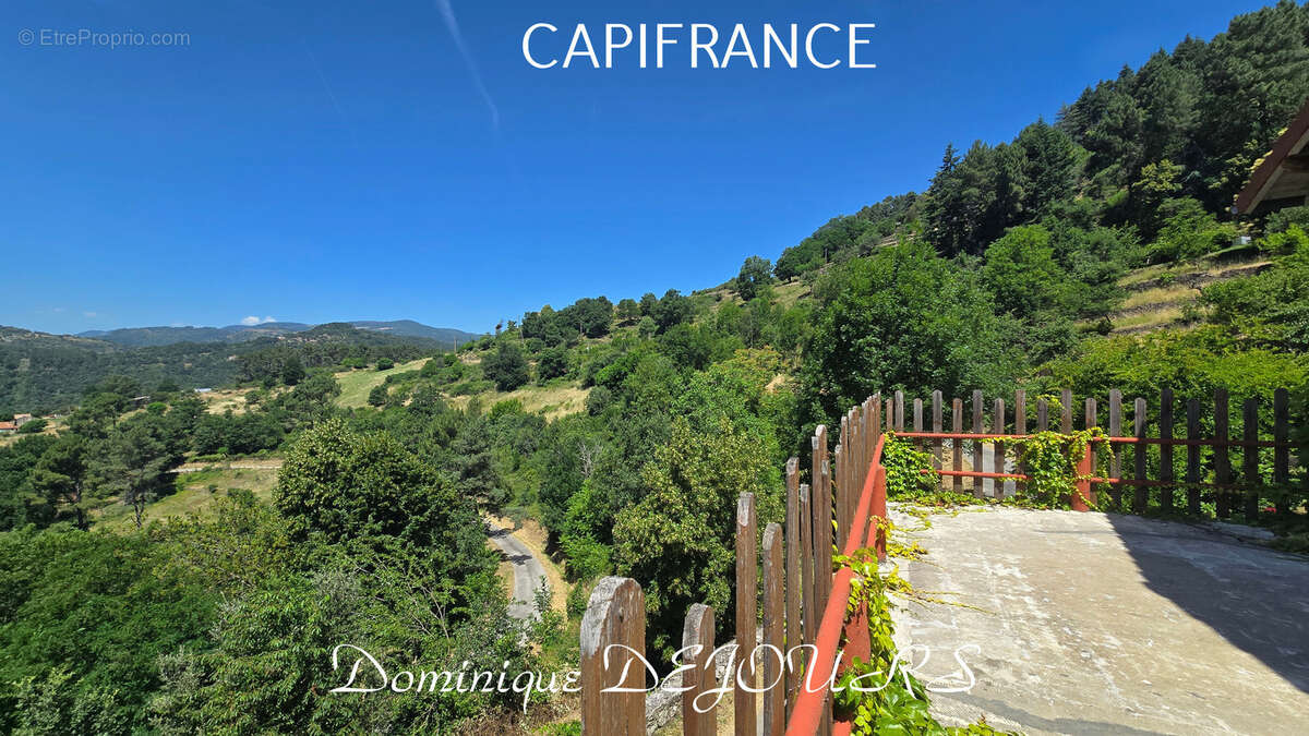 Nichée au cœur de la nature, sans vis-à-vis et avec une vue remarquable, grande maison de 7 (voir 8) chambres et de belles terra - photo 21