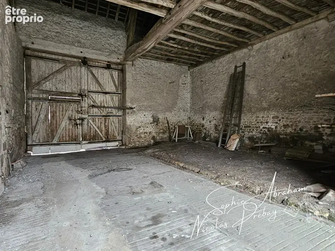 Maison de ville avec dépendances et fort potentiel en centre-ville de Toury - photo 12
