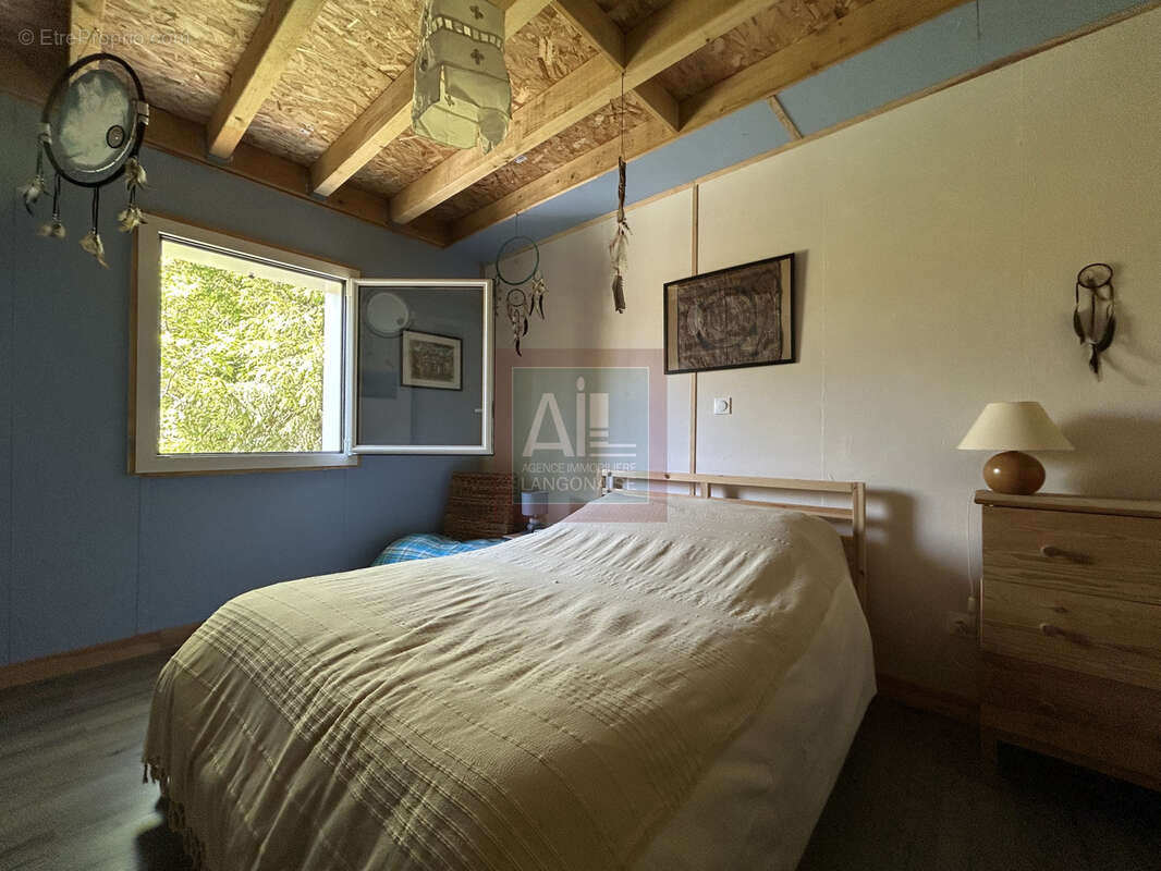 Maison de plain-pied sur terrain arboré de 2 200 m2 - photo 6