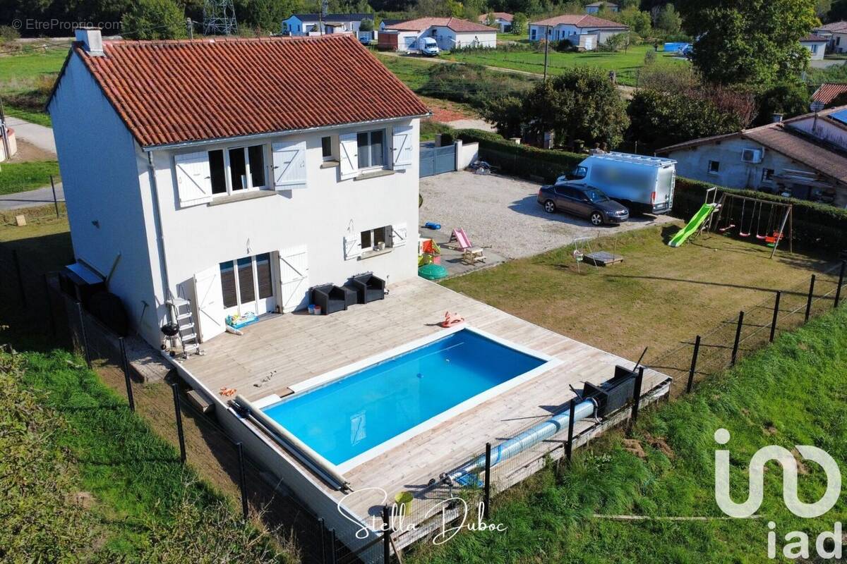 Photo 1 - Maison à MEAUZAC