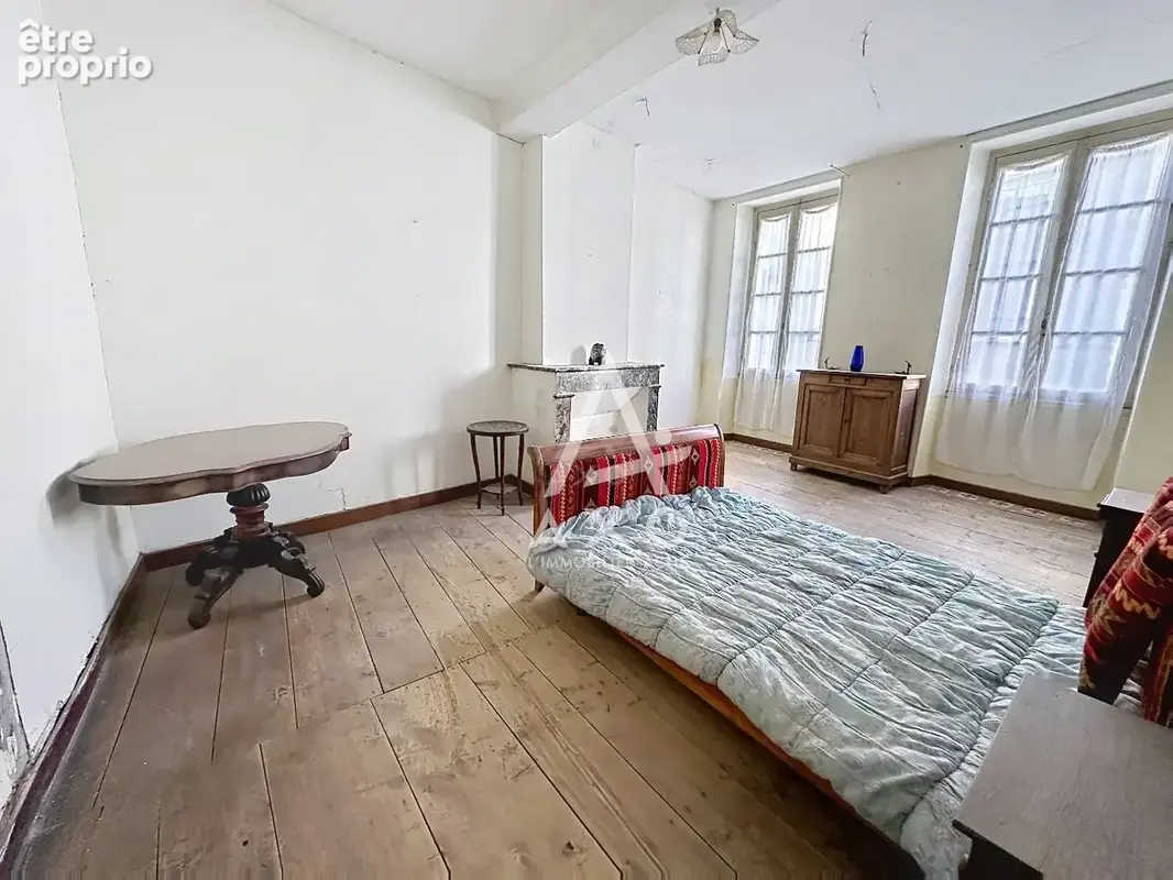 Maison de ville de caractère à rénover d'environ 228 m² - photo 4