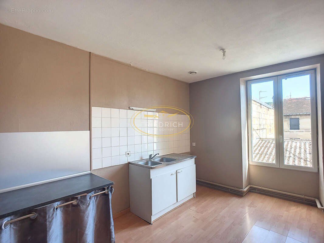 Appartement type f3 au coeur du centre - photo 3