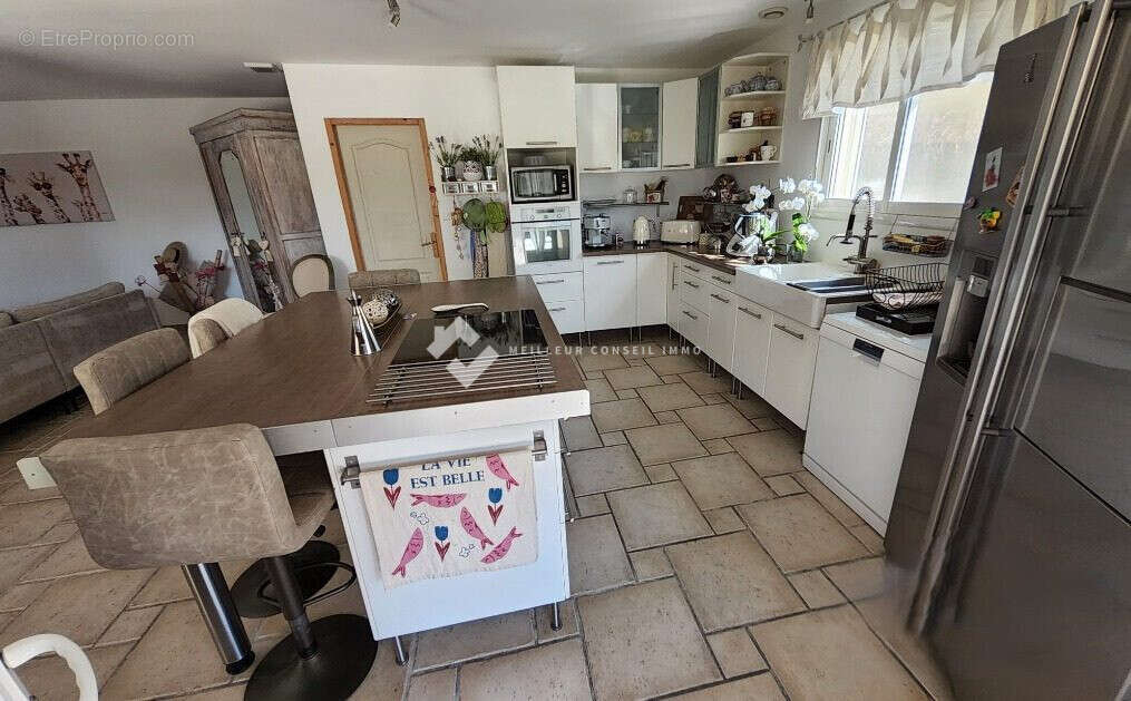 Maison 130 m² à Saint-Julien-De-Cassagnas  - photo 7