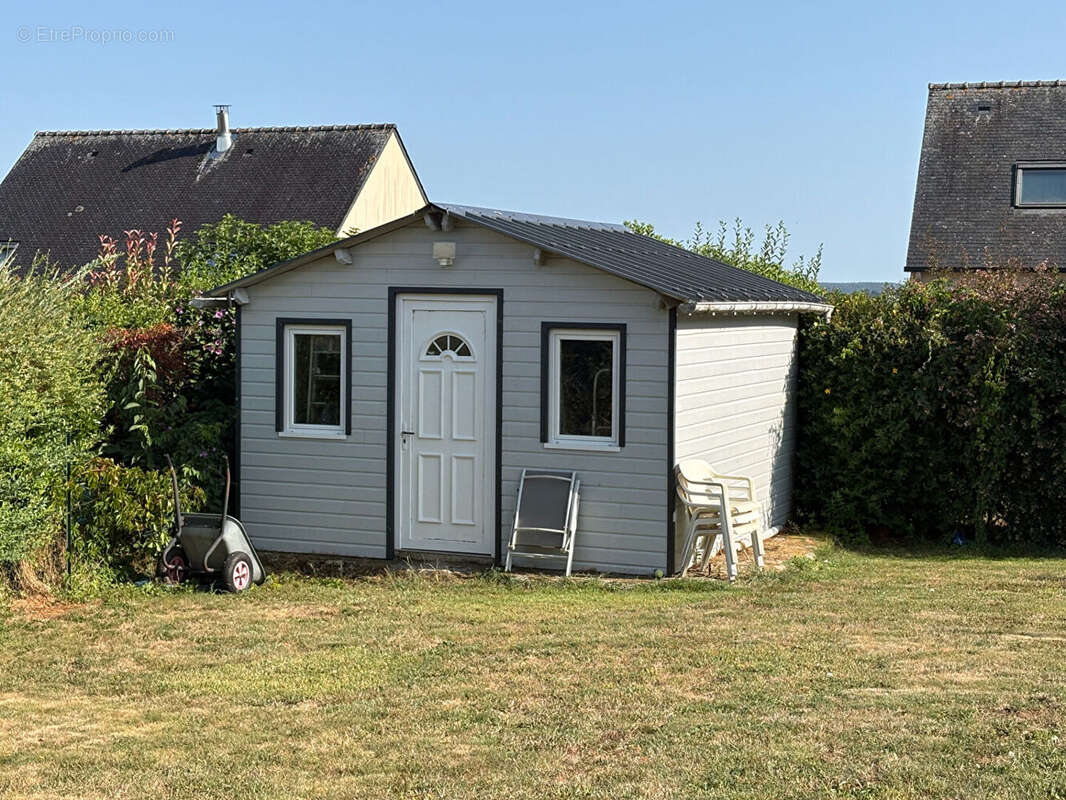 A vendre Guénin, maison de plain-pied, 3 chambres terrain d'environ 770m² - photo 8
