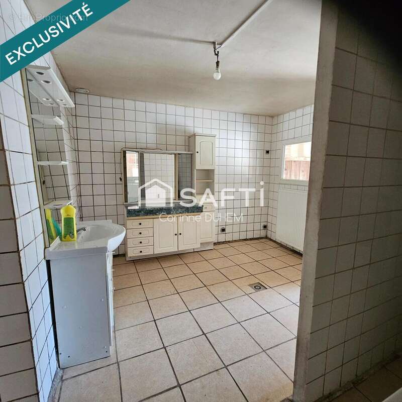 Photo 7 - Maison à LE MONTET