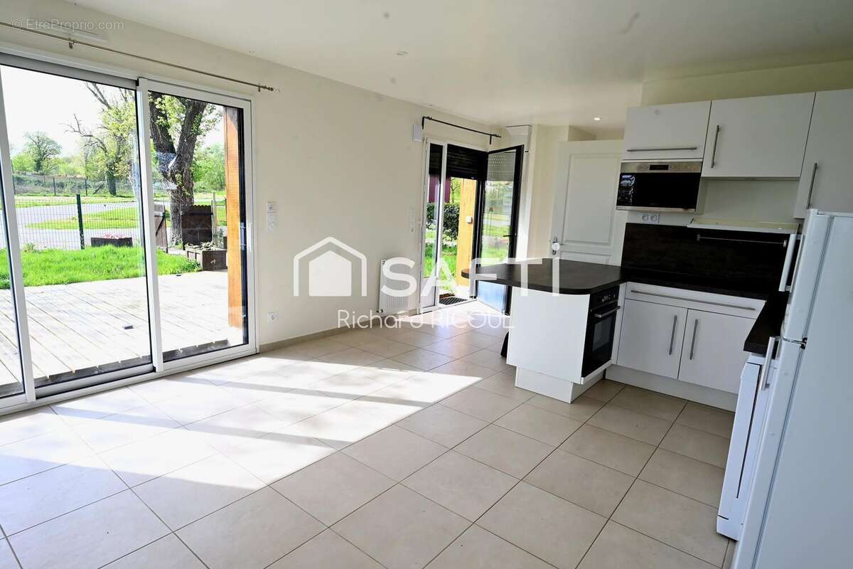 Photo 2 - Maison à AUBERVILLE