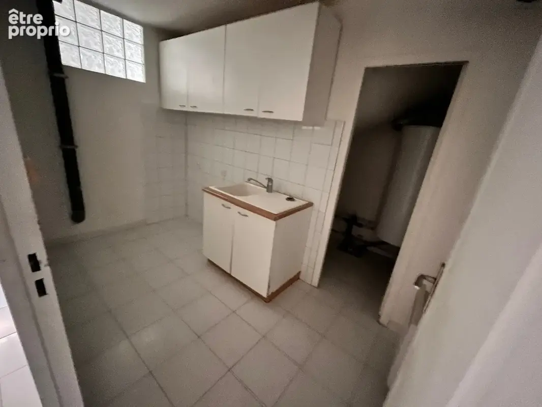 2 Pièces 42,5m2 avec sous sol aménagé 48m2 en Rez de Jardin 170m2 Garage en sous sol - photo 12