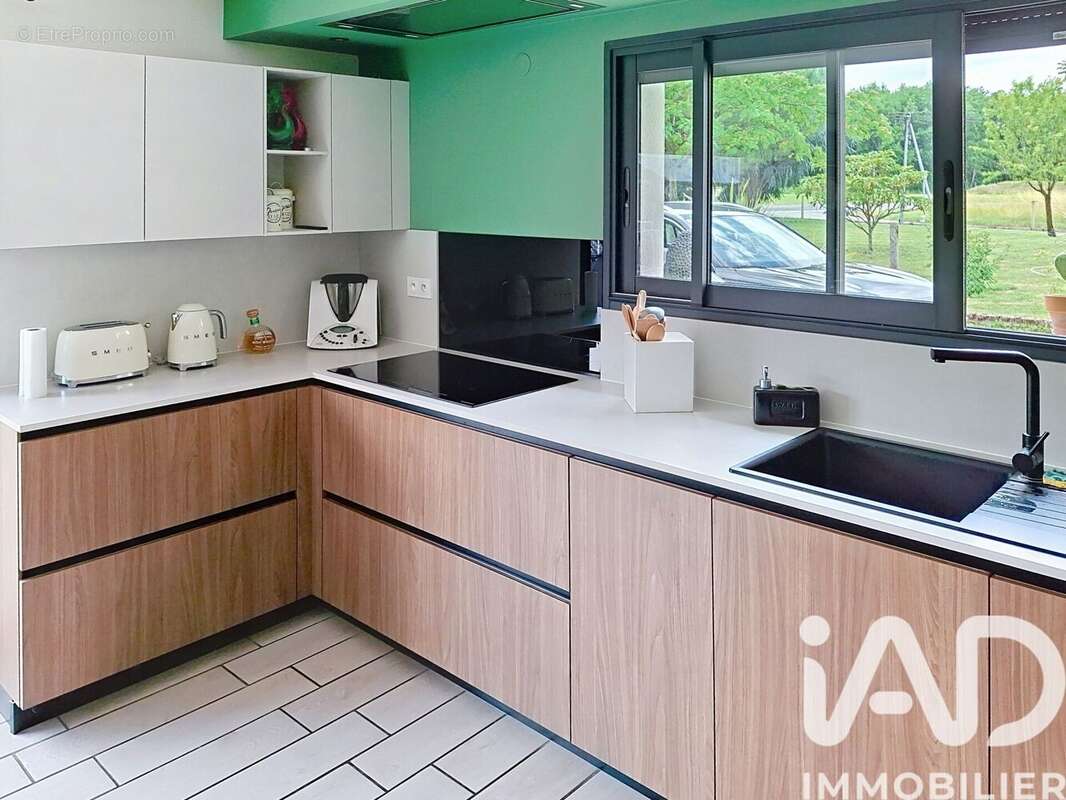 Maison 115 m² à Saint-Etienne-De-Tulmont  - photo 3