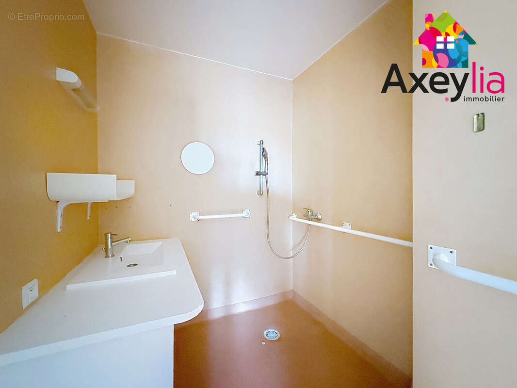 A vendre - roanne hypercentre - appartement t3 pour pmr avec cave et garage - photo 7
