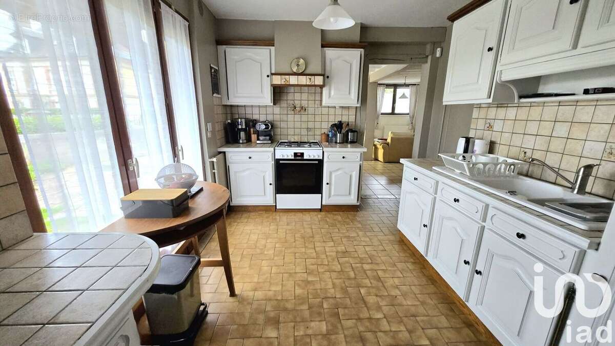 Photo 2 - Maison à SAINT-OUEN-DE-THOUBERVILLE