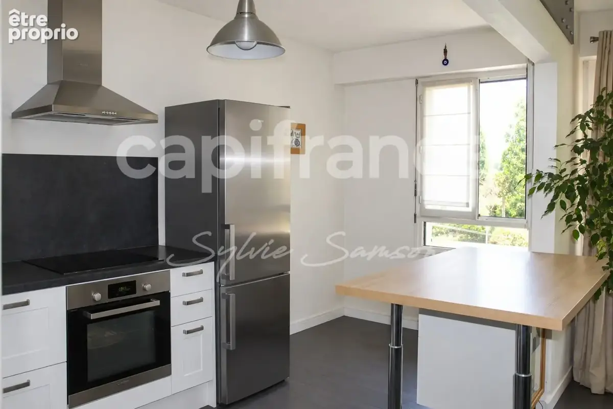 Mantes-la-Jolie – Appartement T3 traversant de 61 m² avec parking, cave et séchoir - photo 4