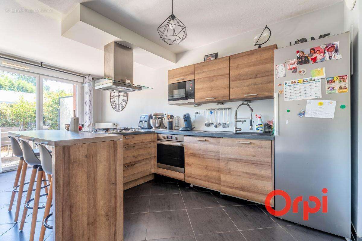 Appartement en rez-de-jardin avec un garage - photo 13