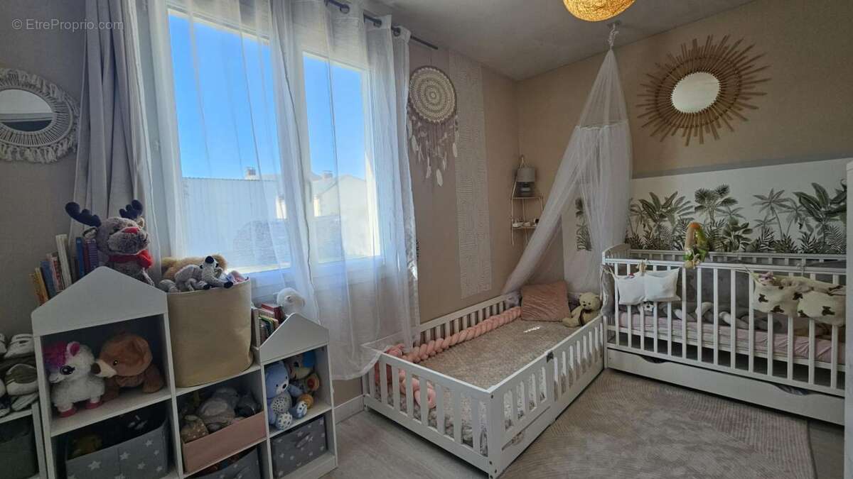 Noyant centre – Plain-pied 3 chambres, jardin sans vis-à-vis et garage de 35 m² - photo 14