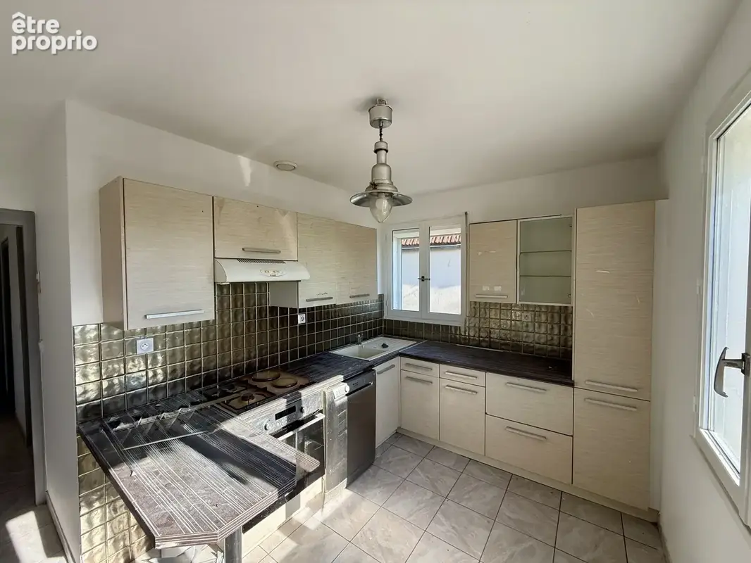 A Vendre maison T5 sur un terrain de 400 m2 - photo 3