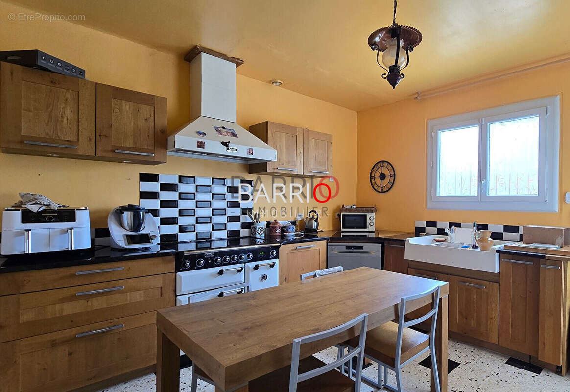 Maison à SAINT-GENIS-DES-FONTAINES