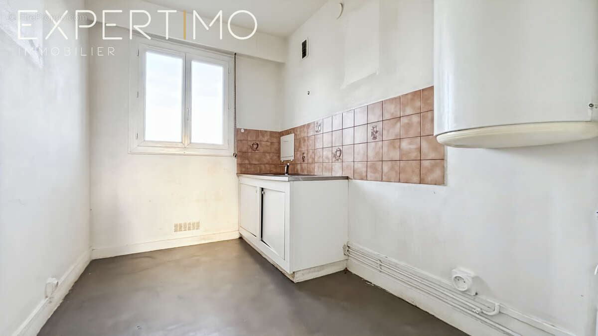 Appartement F3 lumineux à proximité du centre-ville d'Étampes - photo 3