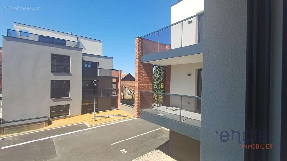 À 8 minutes de Sierentz  Superbe appartement 3 pièces avec terrasse et jardin privatif - photo 10