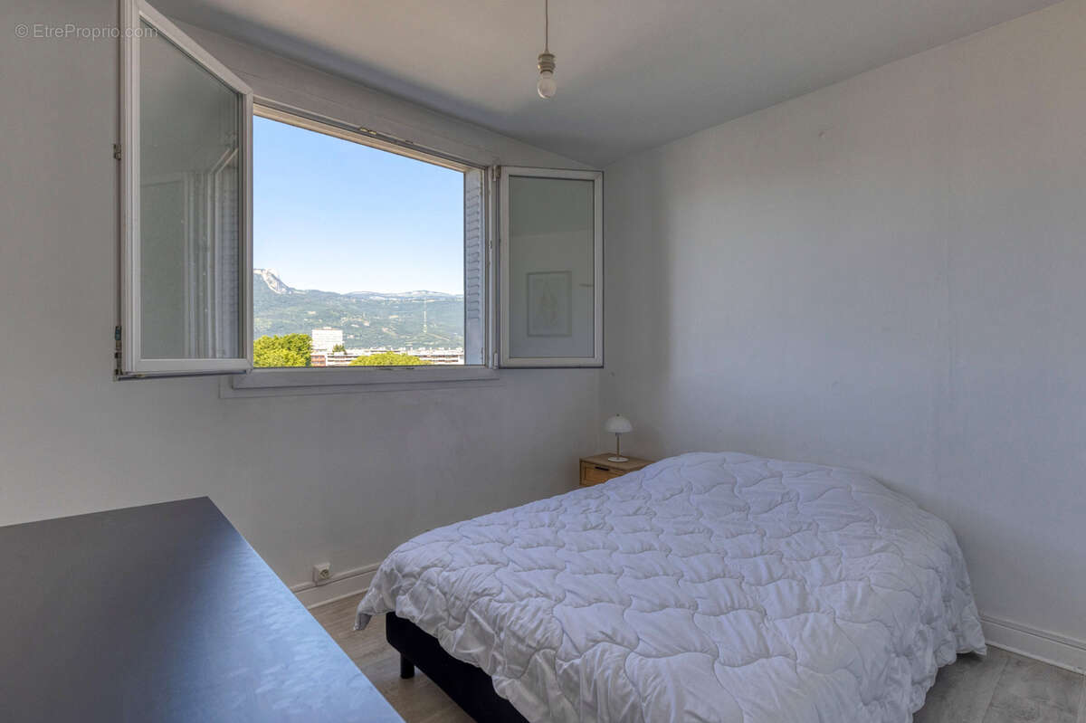 GRENOBLE MALHERBE : T3 55m2 vue massifs et cave en annexe - photo 8