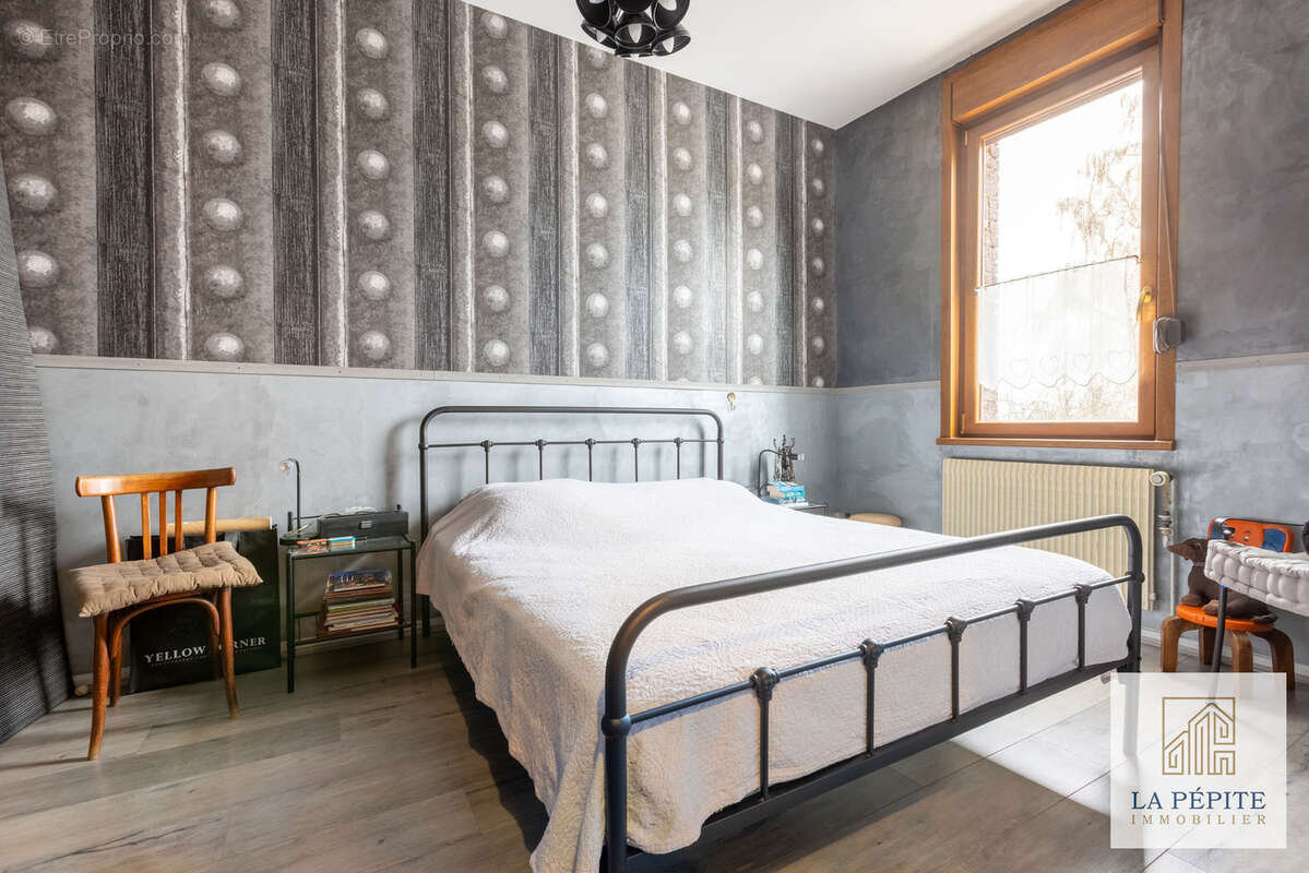 Maison à QUIEVRECHAIN