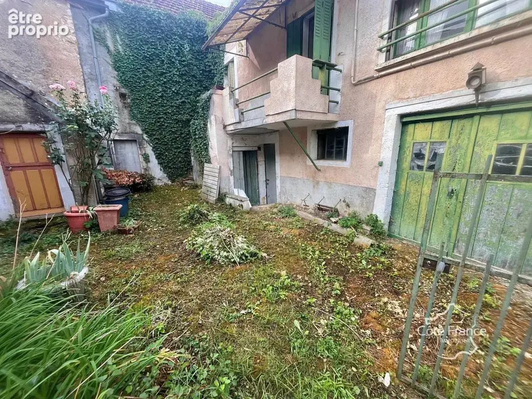 Maison à rénover avec grand garage et un jardin de 100m2 - photo 2