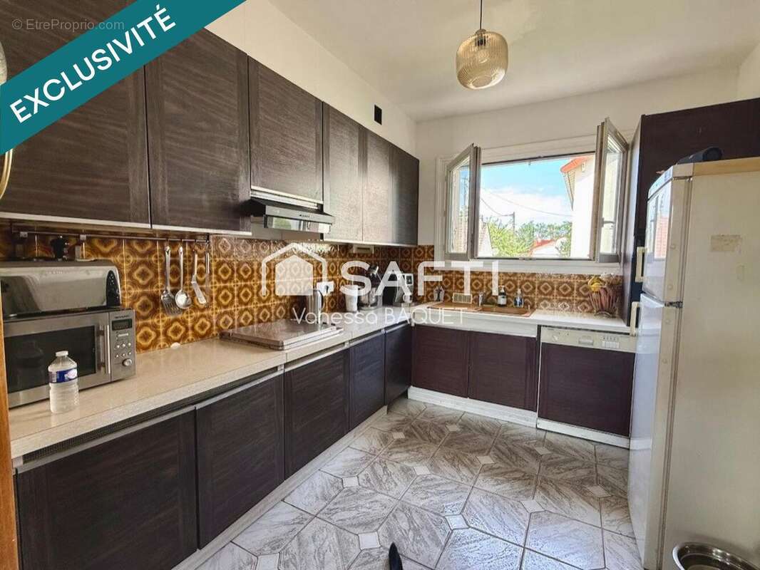 Maison 95 m² à Le Plessis-Bouchard  - photo 7