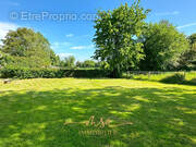 Terrain à MESNIL-RAOUL