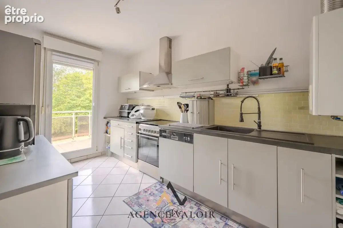 A vendre talange   appartement 61,64 m2   balcons   garage   cave - photo 2