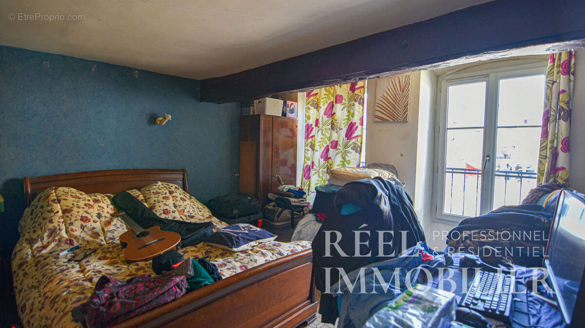 Immeuble de rapport au coeur de la basse ville - photo 9