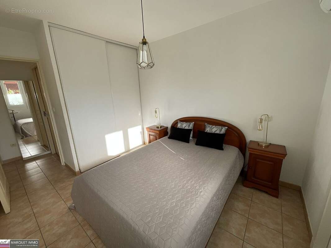 Agréable appartement T3 offrant 51 m² avec terrasse de 6 m² en rez-de-jardin d'une résidence sécurisé avec des espaces verts des - photo 6