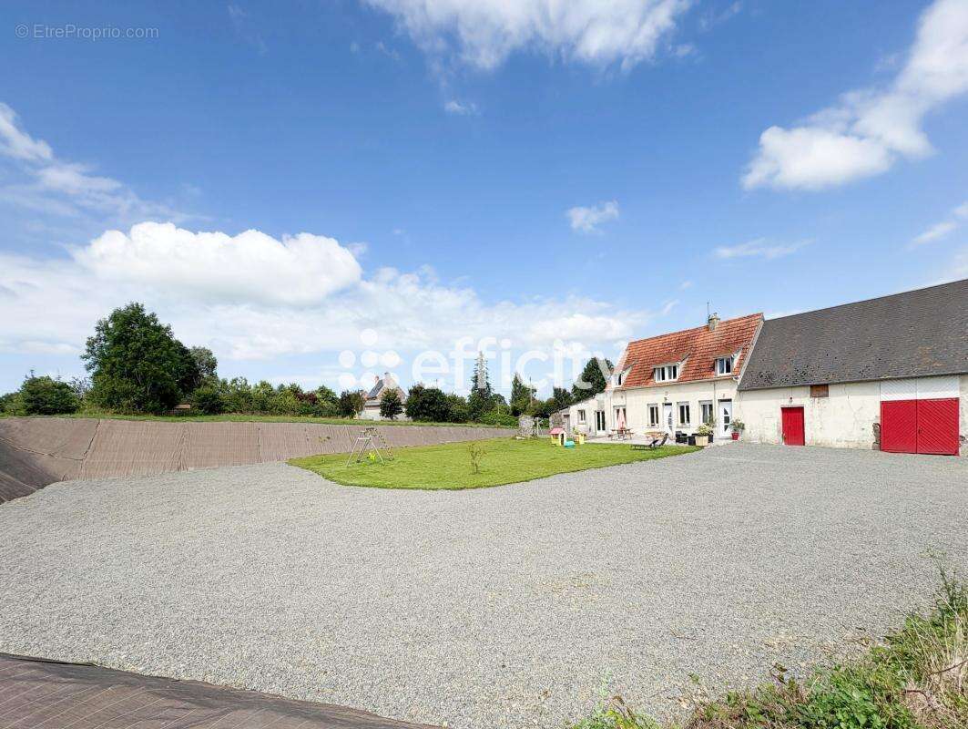 Maison à TESSY-SUR-VIRE