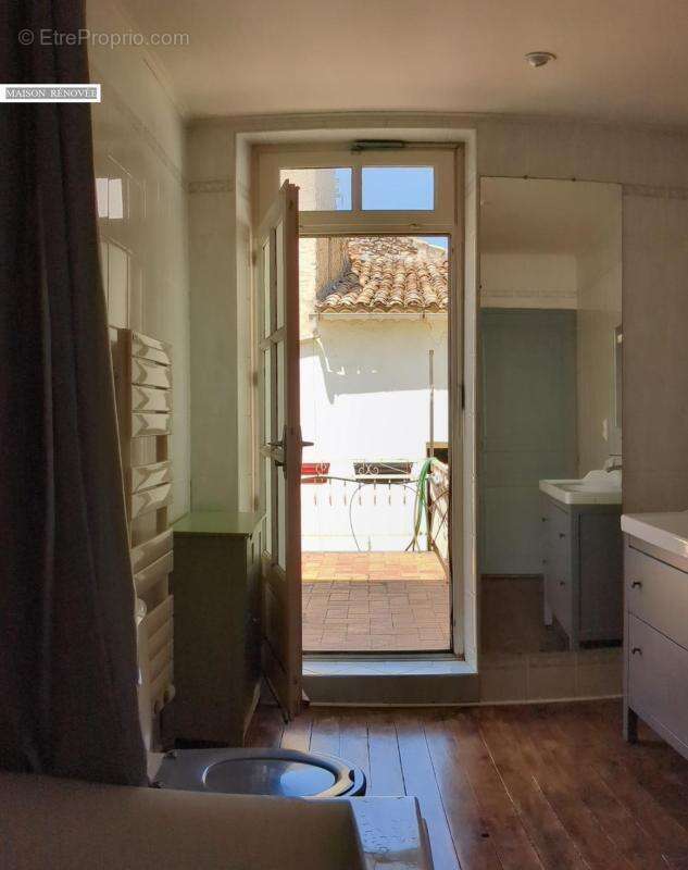 Ensemble immobilier/ 2 maisons,1 appartement en ville - photo 15