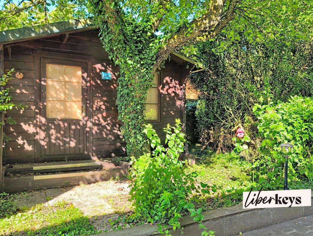 Maison de campagne située à BOURTH, 3 chambres, nombreux garages et remises sur terrain de 1024m2 clos et paysagé - photo 20