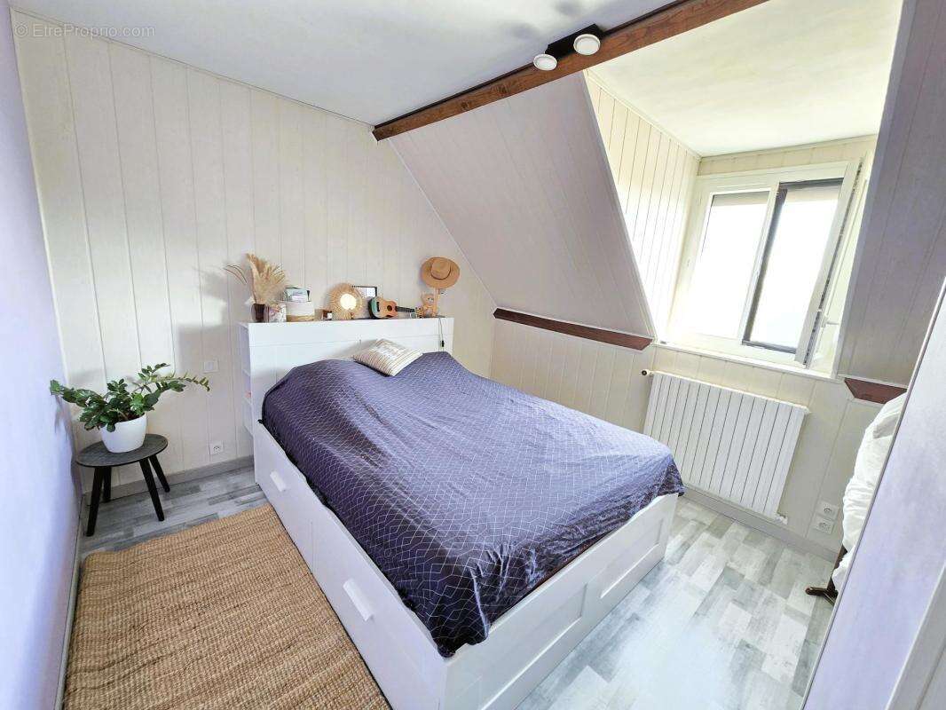 maison de 5 pièces de 124m² - photo 5