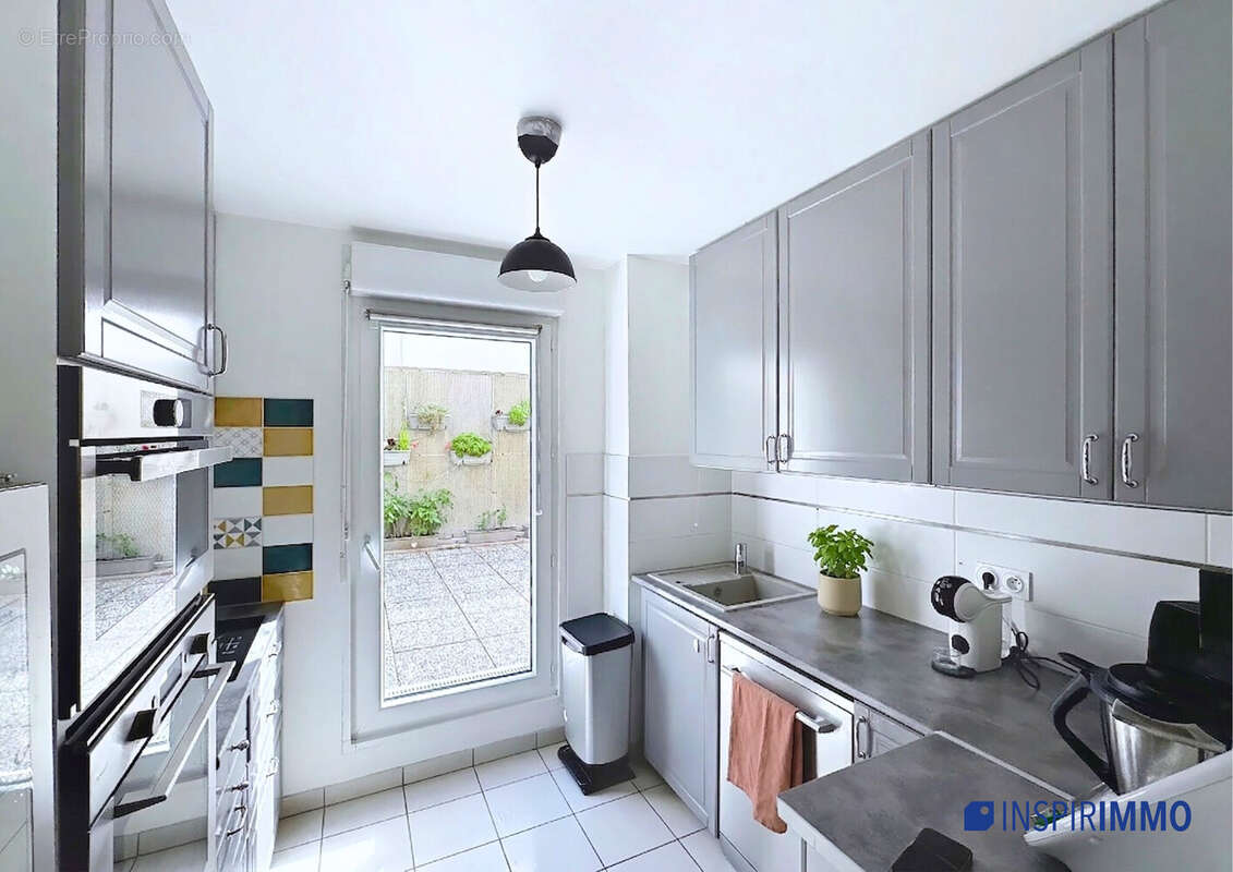 Cuisine aménagée et équipée - Appartement à CARRIERES-SOUS-POISSY