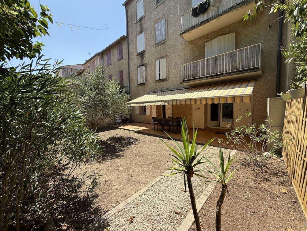 Appartement T2 avec jardin - photo 2