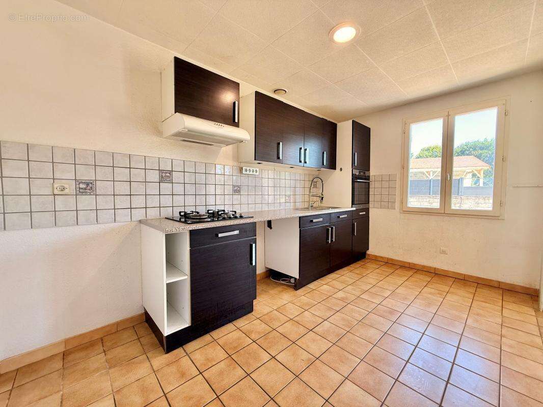 Maison 4 chambres 108m² - photo 4