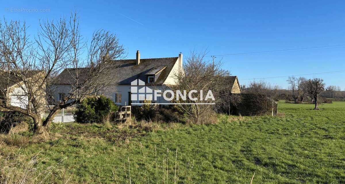 Maison à SAINT-AUBIN-DE-LOCQUENAY