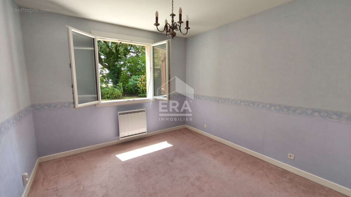 Maison 148m² à saint-denis-lès-bourg - photo 4