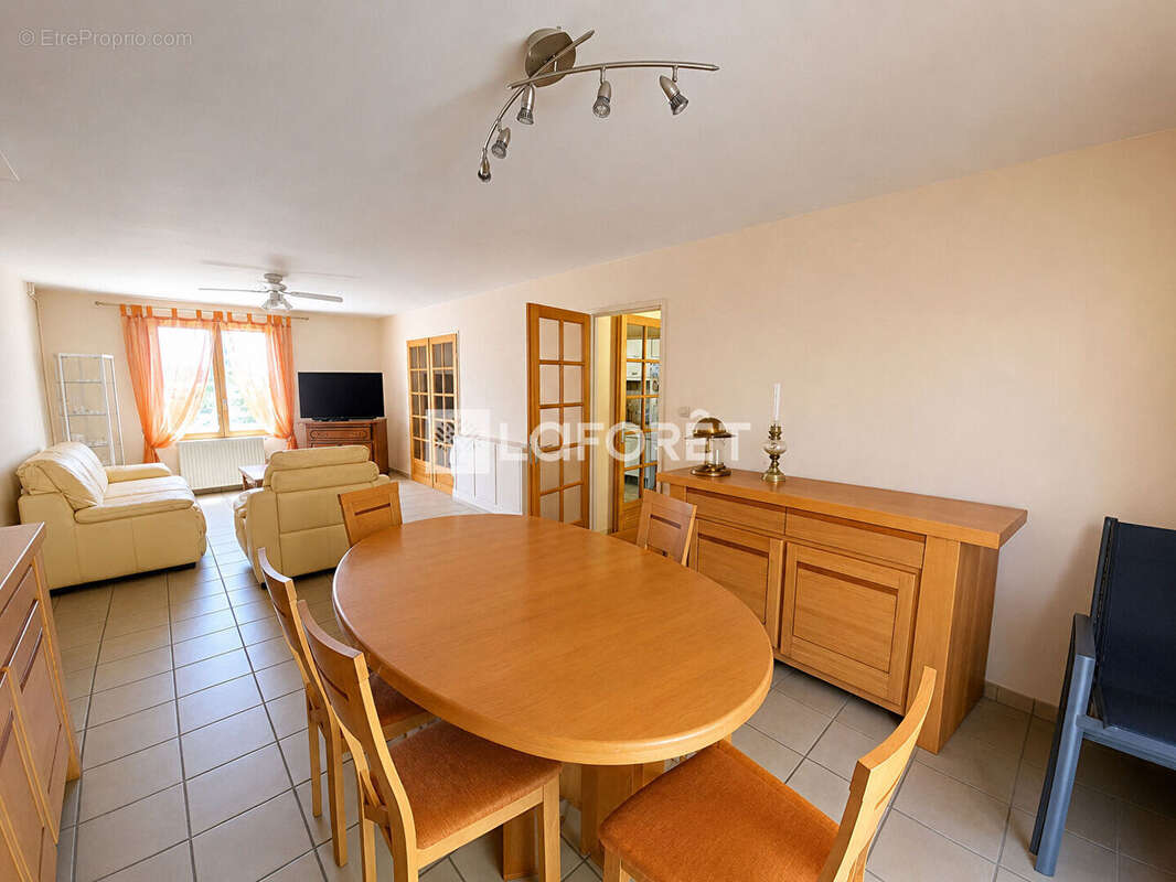 Maison La Talaudiere 6 pièce(s) 102 m2 - photo 2