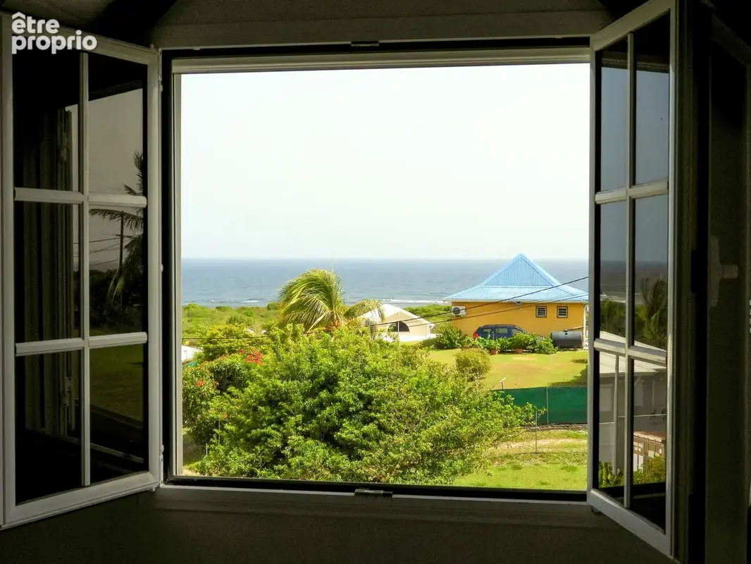LE MOULE — Maison familiale avec vue mer + appartement T3 indépendant  Terrain de 4 840 m2 constructible - photo 25