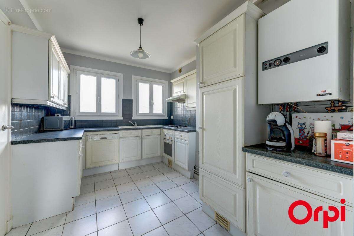 CALUIRE CENTRE BOURG - T3 de 79 m² avec vue dégagée - photo 7