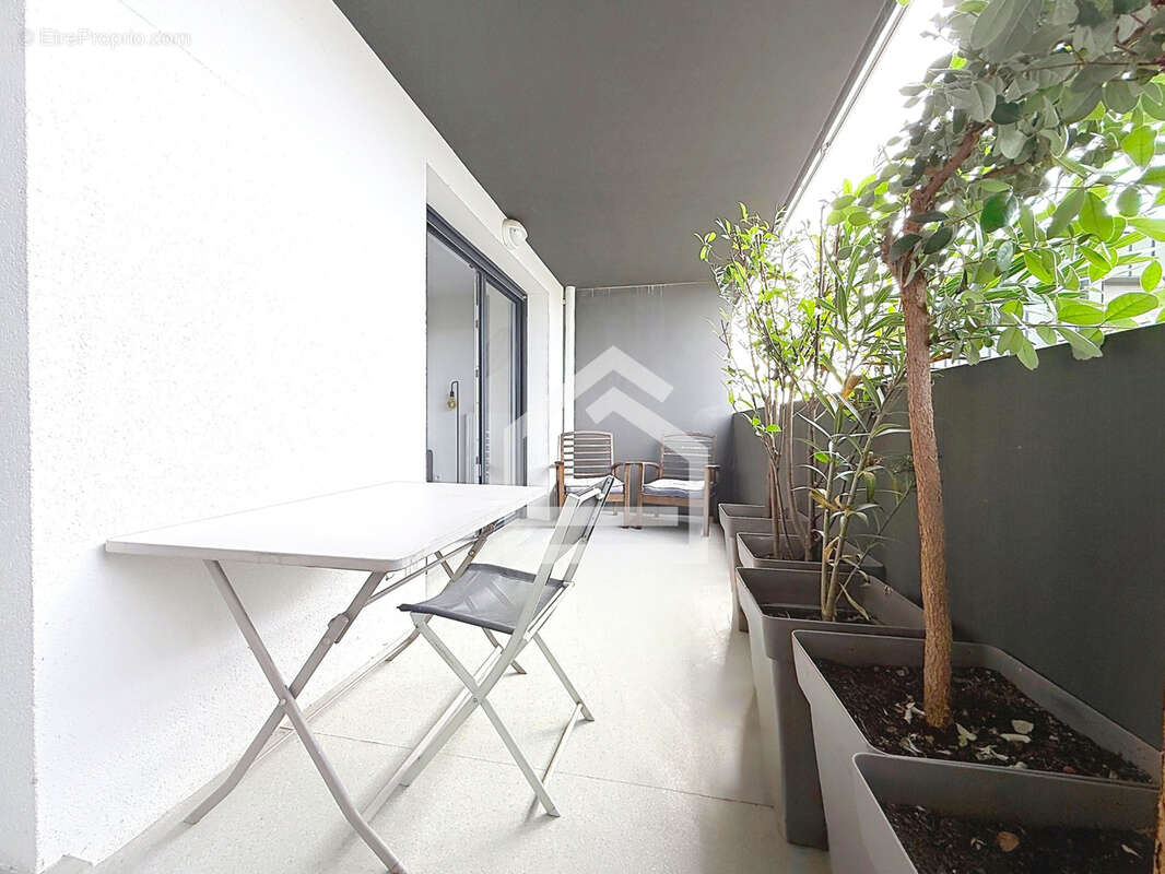 Appartement contemporain 4 pièces avec balcon au sein d'une résidence récente - photo 8