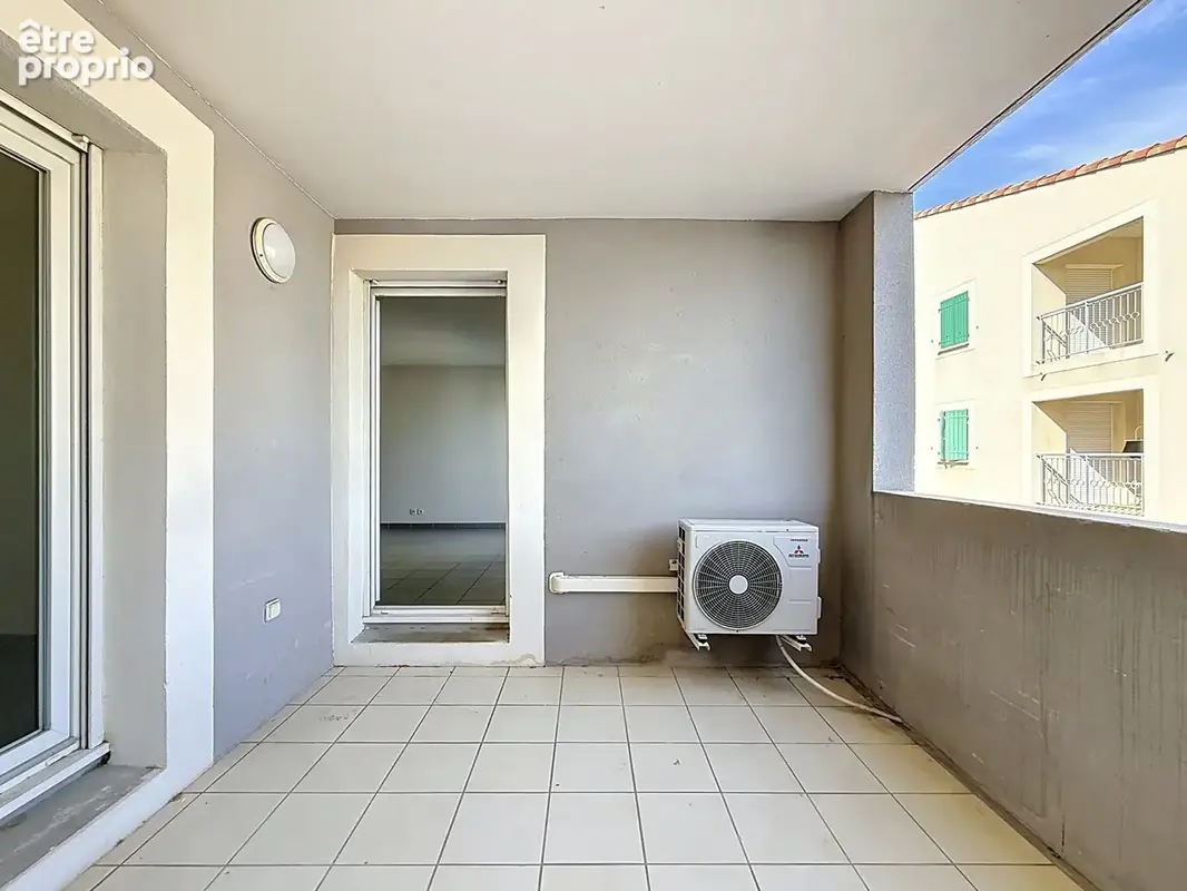 Appartement T3 en résidence sécurisée - photo 3