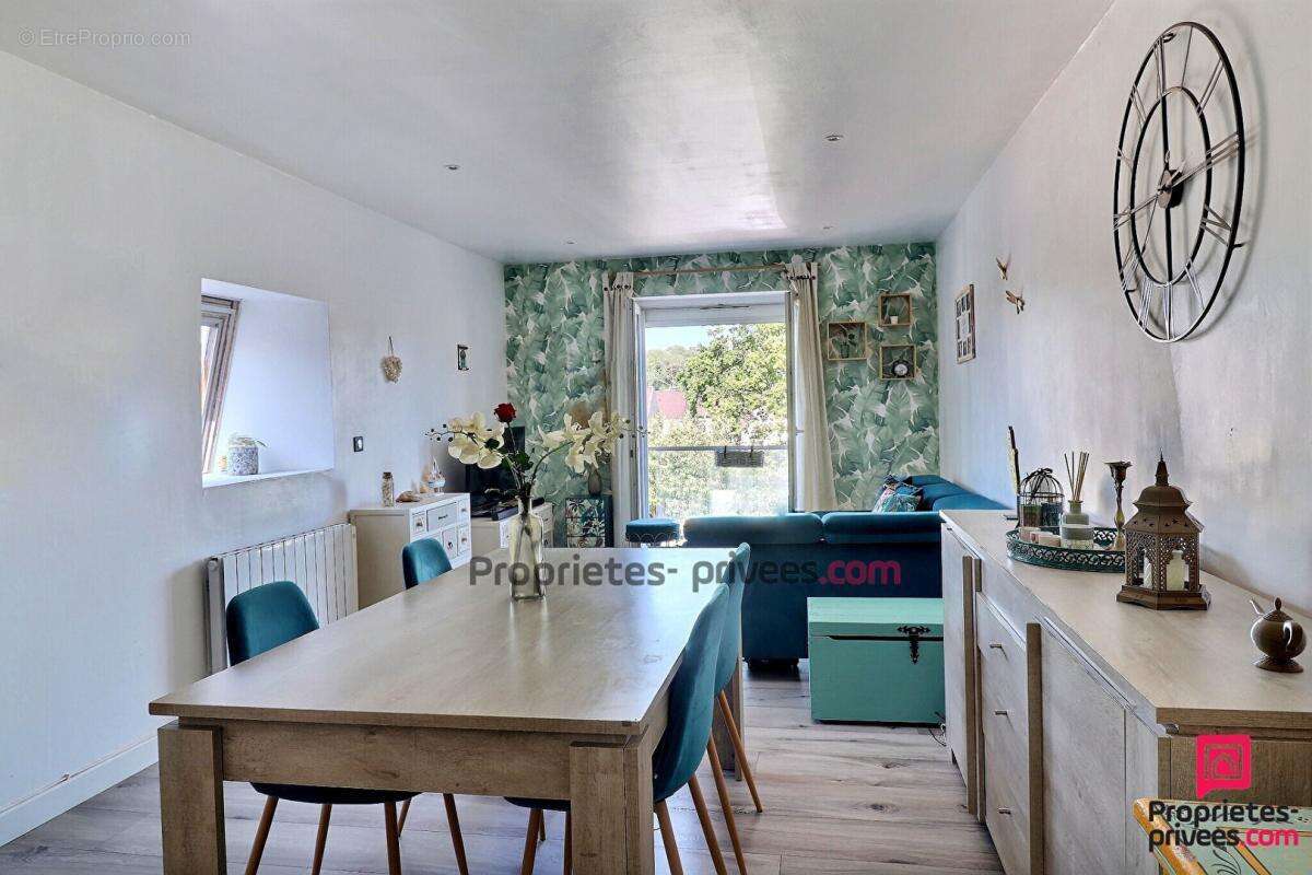 Appartement 4 Pièces avec Jardin Privatif et Garage à Sainte-Geneviève-des-Bois - photo 2