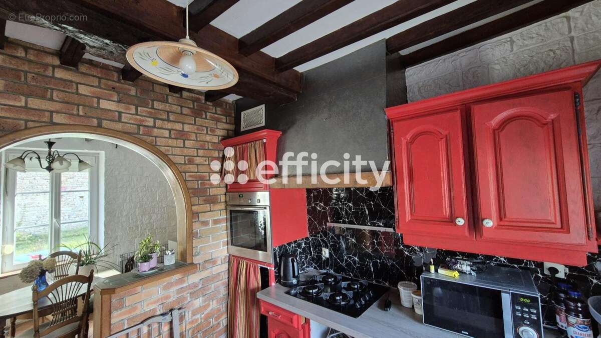 Maison à PORT-EN-BESSIN-HUPPAIN