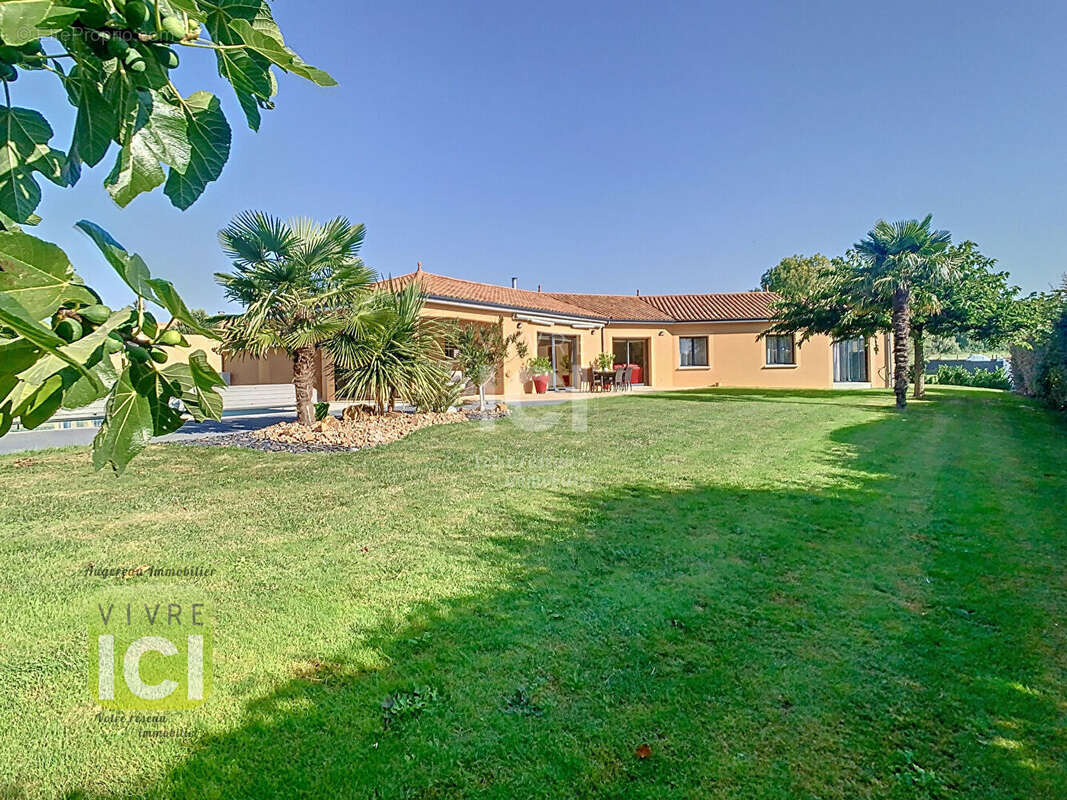 Maison de plain-pied 163.85 m2 - photo 5