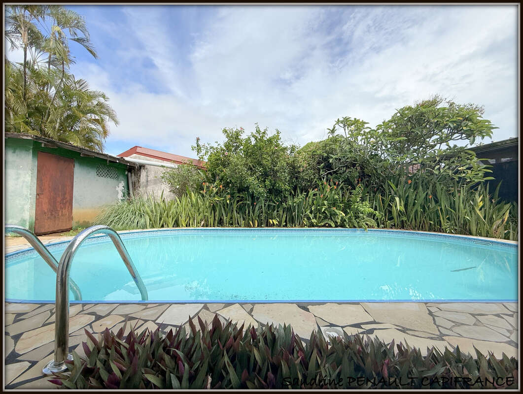 A vendre a kourou (97310) une charmante maison t5 de 106 m² - terrain de 440 m² - au prix de 318 000 € - photo 5