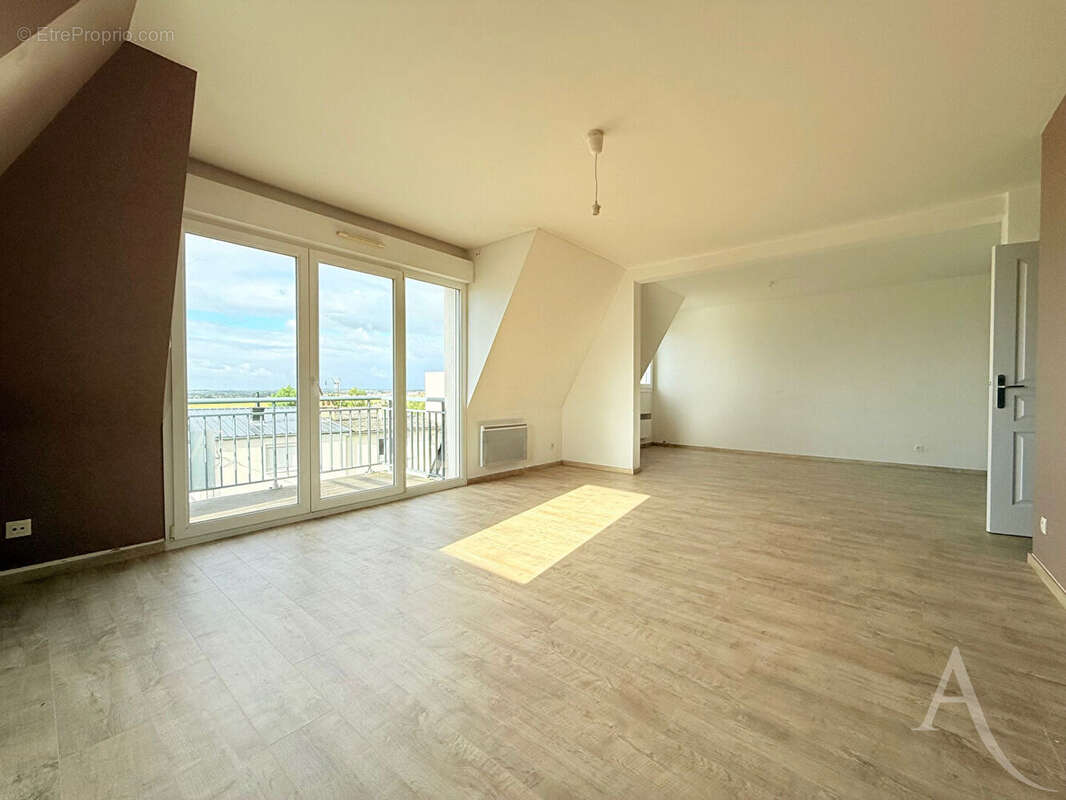 Appartement spacieux en dernier étage - photo 2