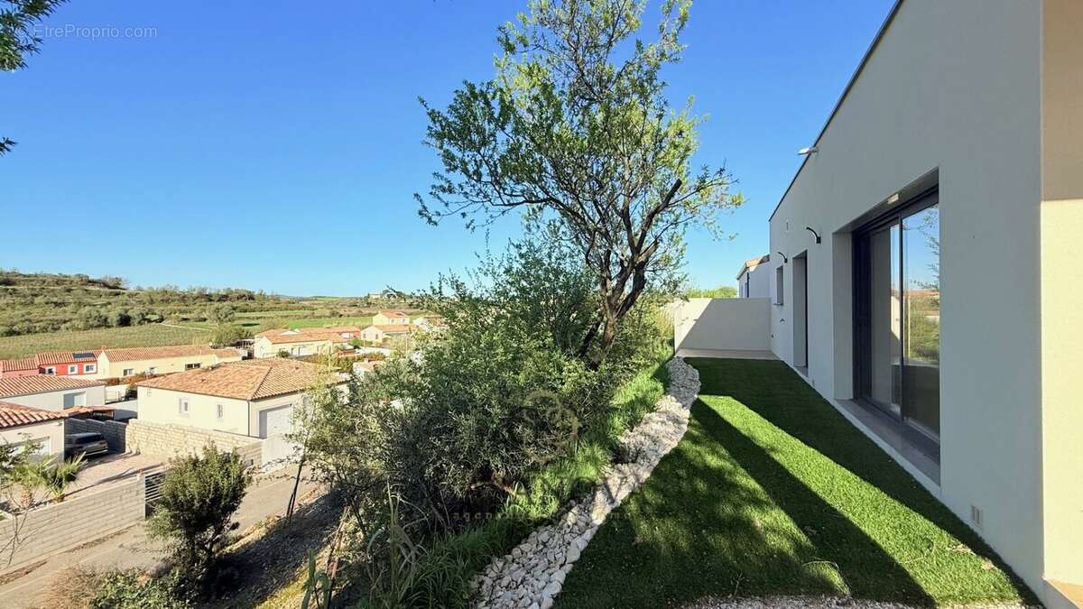 Villa contemporaine neuve avec piscine lagon et vue campagne à Magalas - photo 12